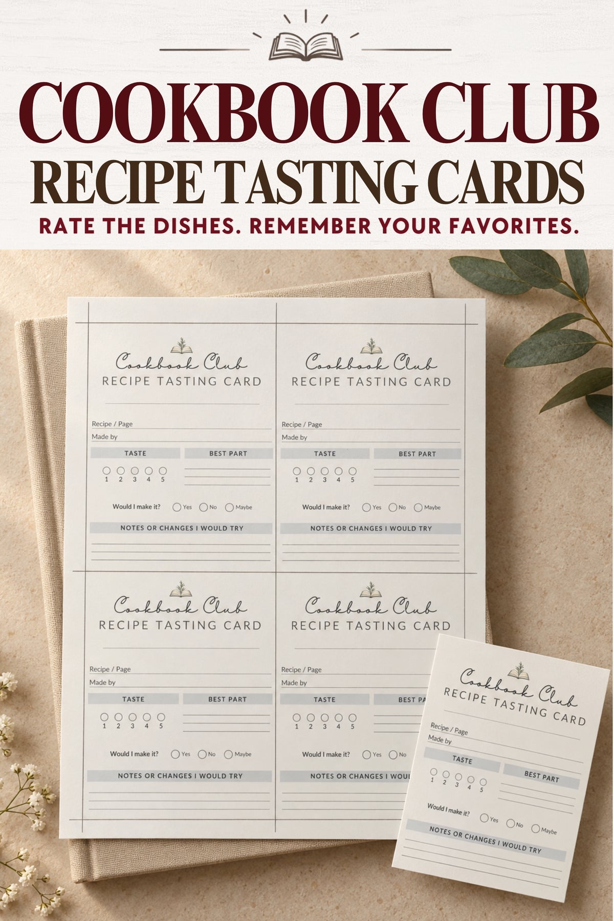 Six 'Cookbook Club' recipe tasting cards are displayed on a textured beige surface with decorative dried flowers and green leaves. The top of the image features a banner with the text 'COOKBOOK CLUB RECIPE TASTING CARDS' and 'RATE THE DISHES.